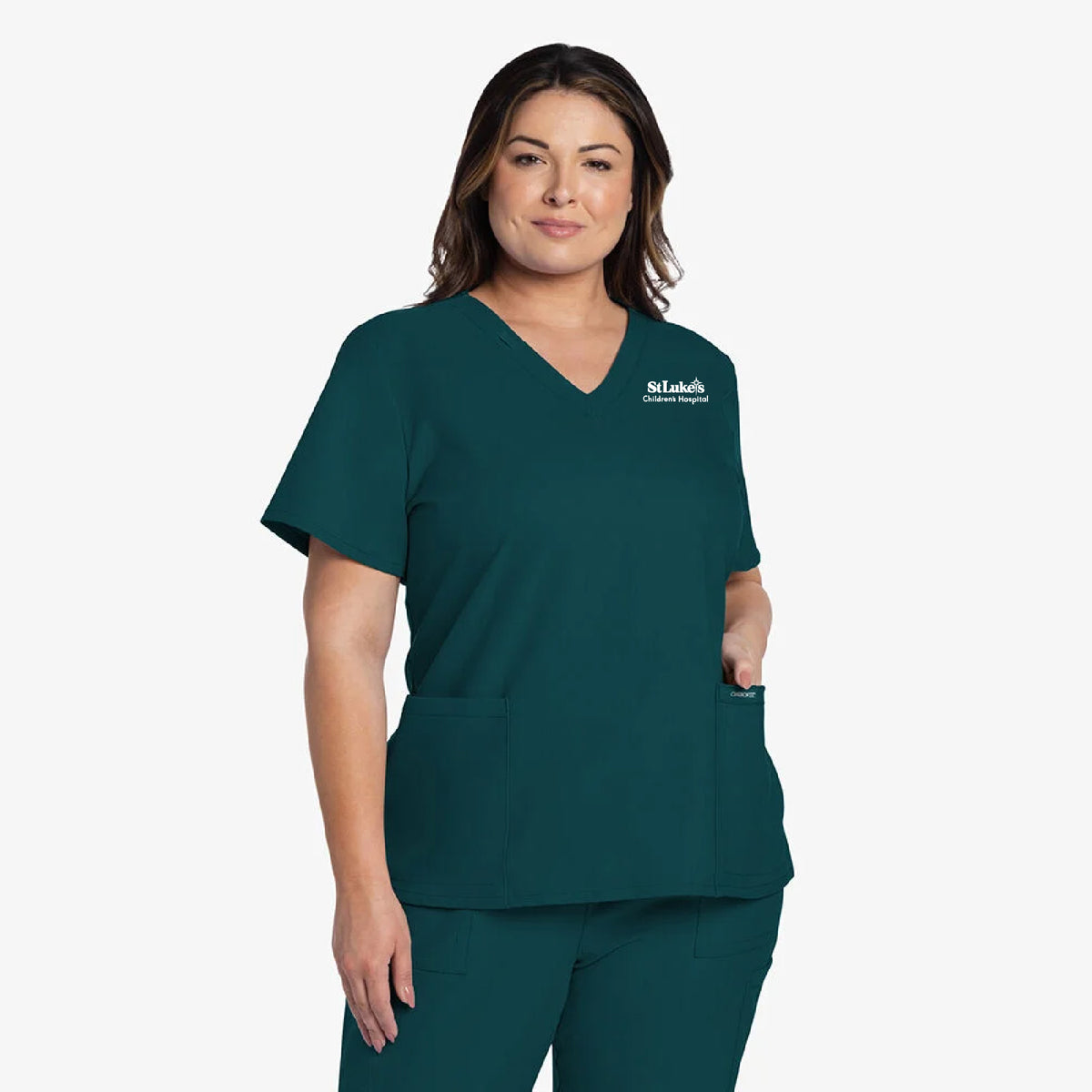 Person wearing a Carolina Scrubs with 'St. Luke's Children's Hospital' logo on a white background