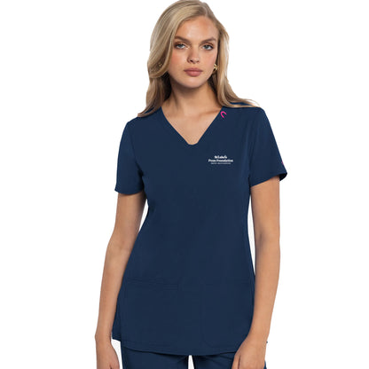 Navy blue scrub top with a logo on a white background